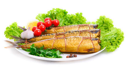 Smoked fish on plate close up, golden mackerel