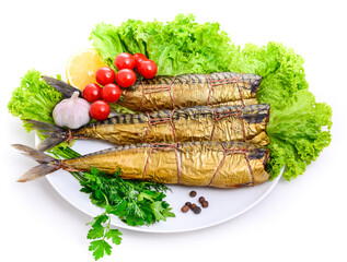 Smoked fish on plate close up, golden mackerel