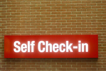 self service check in sign at airport