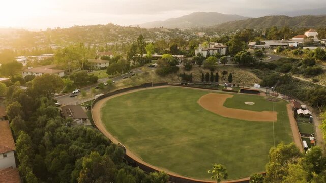 drone of a baseball stadium on a small college campus in Los Angeles on a warm day