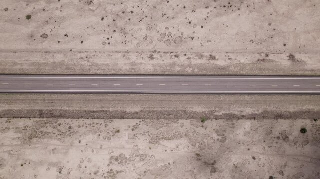 An empty stretch of desert highway in west Texas, aerial view