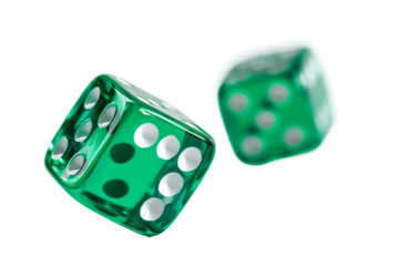 Pair of vibrant green dice rolling dynamically isolated on transparent background