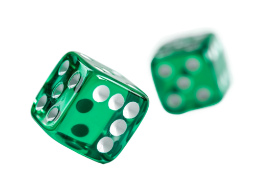 Pair of vibrant green dice rolling dynamically isolated on transparent background
