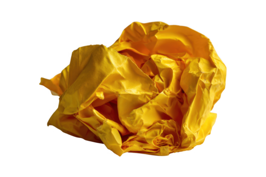 Crumpled Gold: A golden yellow crumpled piece of paper catches the light, creating depth and shadow in its many folds. A vibrant texture speaks of creativity and discard.