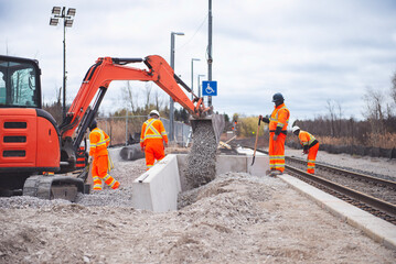 installing a new section of raised platform, railway site Сanada