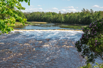 View to the Venta rapid in Kuldiga on a sunny day in May in Latvia