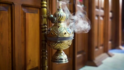 Orthodox Censer with Rising Incense Smoke in Church Ritual 