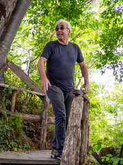 old man spending time in the forest