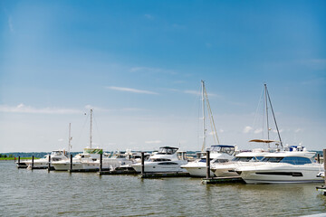 Marina with yachts and pier on the Potomac River in National Harbor, near Washington DC.
