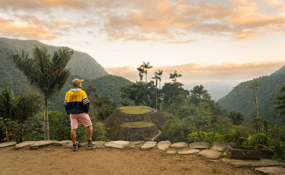 traveler hiking in the lost city ciudad perdida Tayrona mountains in sierra nevada of santa marta in colombia amazing landscape sunset 