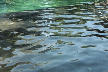 Outdoor swimming pool with clear water, closeup