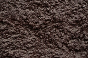 Brown textured surface as background, closeup view