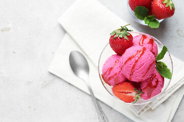 Tasty sorbet with strawberries and mint served on light table, flat lay. Space for text