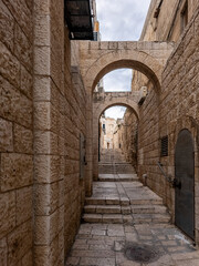  Stone steps in the narrow street in the Jewish quarter in the Old City of Jerusalem in Israel
