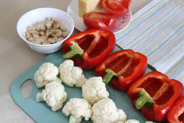 Set of raw products for stuffing and roasting peppers.
