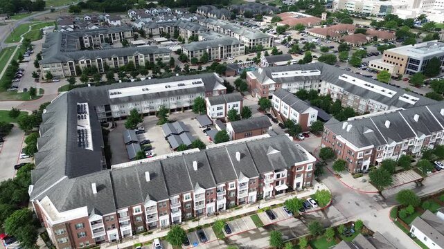 Covered parking in senior community, memory care, assisted living facilities, retirement apartment homes complex in McKinney Medical District suburb Dallas metroplex, fast growing area, flyover