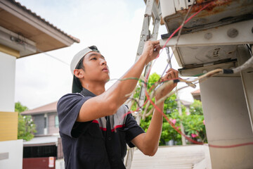 Technician man service for repair and maintenance of air conditioners, Repairman fix air...