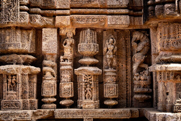 Intricate Stone Carvings on Ancient Indian Temple Wall