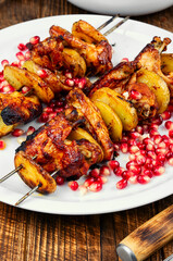 Grilled chicken wings, barbecue grilling kebabs.