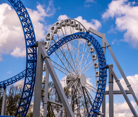 Ferris wheel in the park on a summer day.