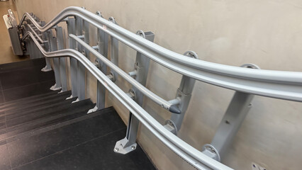 Steel labyrinthine stair rail ascends mysteriously, echoing surreal modernism, perfect for International Art Day celebrations or Escher-inspired events