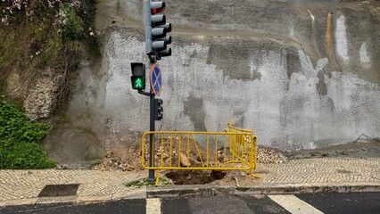 Urban chasm by a solitary traffic light, mysterious void custody, reminiscent of Chaos Never Dies...