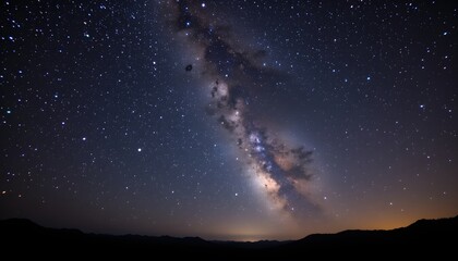 a starry night sky with a fading galaxy effect towards the middle