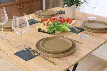 An Elegant Dinner Table Setting Featuring Fresh Ingredients for a Wonderful Gathering