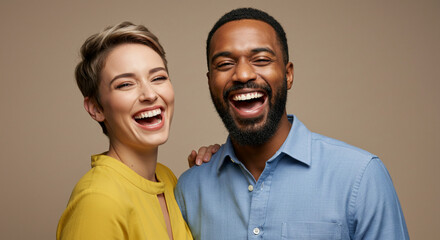 Funny best friends and couple laughing cheerfully while standing together in a studio