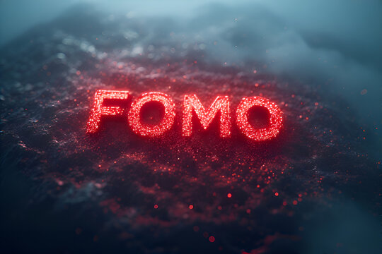 The word fomo is written in red glowing letters on a dark background