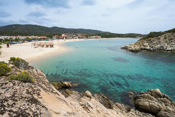 Beautiful coastal view showcasing turquoise waters and sandy beach at village Kalamitsi on Sithonia peninsula, Greece