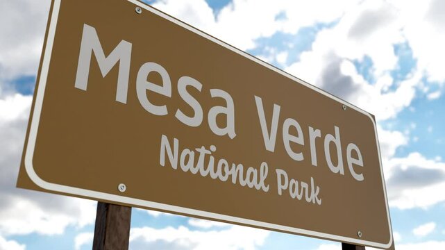 Mesa Verde National Park (Colorado) Road Sign Against Blue Sky and Clouds. One of The US National Parks Series.