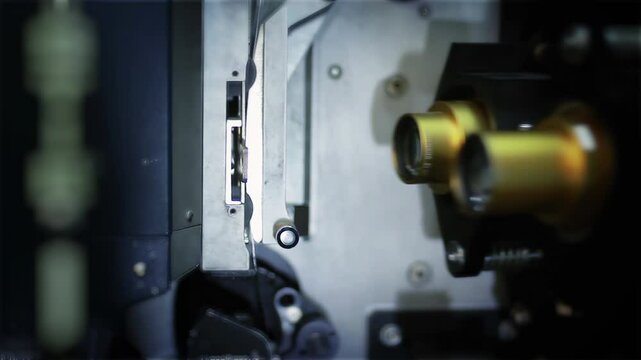 Close-Up of Viewfinder System on Vintage Christie 35mm Film Projector in Projection Booth, 4K