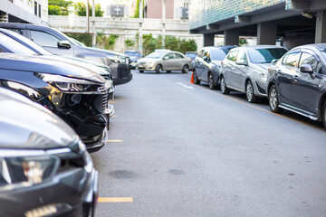 Fototapeta premium Front view of car parking lot outdoor parking in resident
