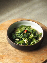 stir fried water spinach or morning glory with garlic and chili
