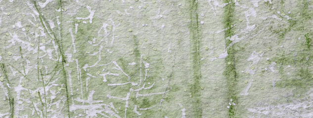 Watercolor background in light green, olive and white colors, abstract artistic texture with stains...
