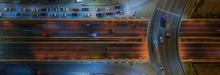 Expressway, Self-driving autonomous electric cars of the future with HUD elements move along a busy traffic intersection. Concept: Artificial Intelligence, Car Scan, GPS Tracking, Smart Roads, IoT