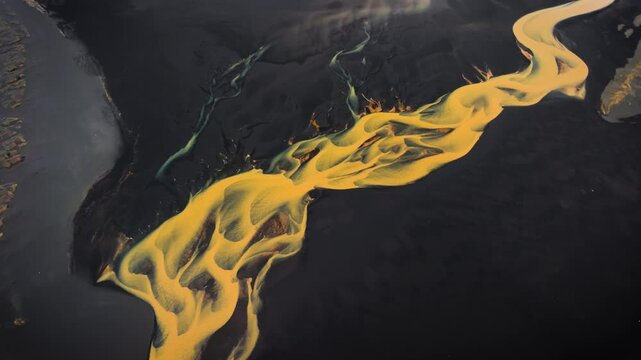 Exclusive Cinematic 4K Aerial Footage of Rare Yellow River Flowing Over Black Sand on South Coast of Iceland