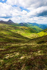 Verdant panorama of the Jordanne Valley from the ridge between Puy de Peyre Arse and Puy Mary
