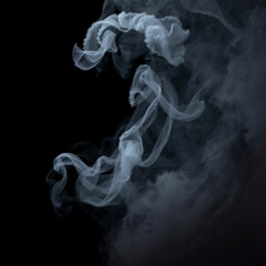 Fototapeta premium Real smoke exploding outwards with empty center. Dramatic smoke or fog effect for spooky Halloween background.