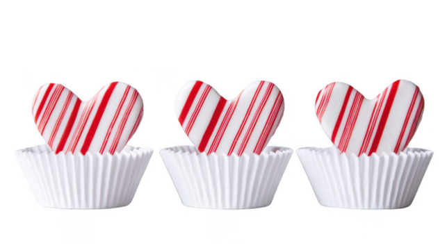 3 candy cane-shaped hearts in three white paper cupcake cases on a pure, clean background, png, transparent