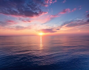 Obraz premium Peaceful Ocean Sunset with Colorful Sky and Calm Waves – Tranquil Seascape Horizon