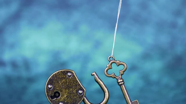 Key and padlock on blue background. Escape room game and solution concept.