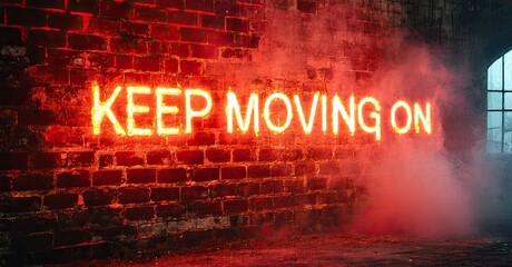 Red neon sign displays Keep Moving On against brick wall. Smoke adds dramatic effect, dark background enhances glow.