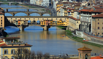 Perfect view with vibrant vivid colors of OLD BRIDGE called PONTE VECCHIO in Italian Language in...