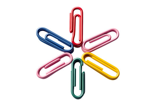 Colorful paperclips arranged in a star shape.