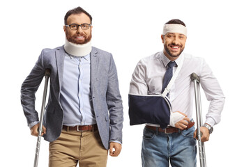 Two young injured men standing with crutches