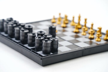 A chessboard with pieces and oil barrels.