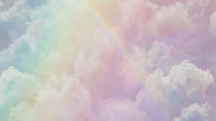 Soft clouds tinted with gentle, faded colors drifting calmly in a tranquil sky setting