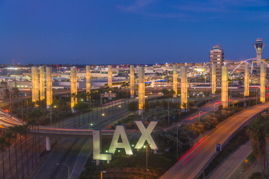 LAX Los Angeles International Airport welcome Sign and pylons at Night